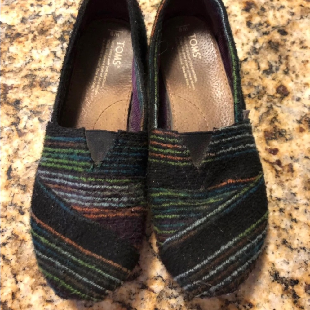 Toms black stripe shoes